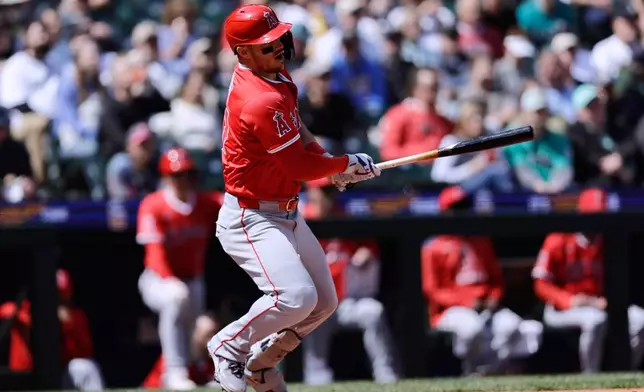 Los Angeles Angels' Mike Trout grounds out against the Seattle Mariners during the third inning of a baseball game, Wednesday, April 30, 2025, in Seattle. (AP Photo/John Froschauer)
