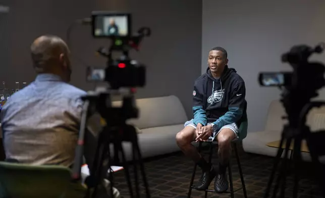 Philadelphia Eagles DeVonta Smith speaks during an interview with the Associated Press in Barcelona, Spain, Monday, May 12, 2025. (AP Photo/Emilio Morenatti)