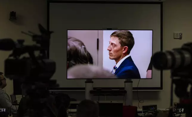 Former Grand Rapids Police officer Christopher Schurr, who is charged with second-degree murder in the fatal shooting of Patrick Lyoya, a Congolese immigrant, appears for jury instructions at the Kent County Courthouse in Grand Rapids, Mich., Tuesday, May 6, 2025. (Joel Bissell/MLive.com/Kalamazoo Gazette via AP)