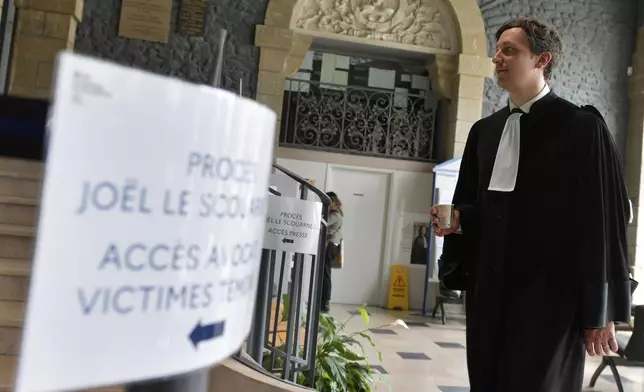 Joel Le Scouarnec's lawyer Maxime Tessier, arrives for the verdict of the a 74-year-old former surgeon, accused of raping and sexually assaulting 299 children, Wednesday, May 28, 2025 in Vannes, Brittany, western France. (AP Photo/Mathieu Pattier)