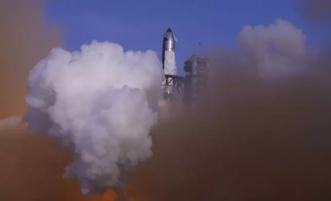 SpaceX's mega rocket Starship makes a test flight from Starbase, Texas, Tuesday, May 27, 2025. (AP Photo/Eric Gay)