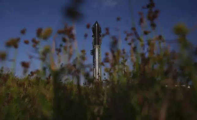 SpaceX's mega rocket Starship stands ready for a test flight from Starbase, Texas, Tuesday, May 27, 2025. (AP Photo/Eric Gay)