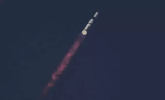 SpaceX's mega rocket Starship makes a test flight from Starbase, Texas, Tuesday, May 27, 2025. (AP Photo/Eric Gay)