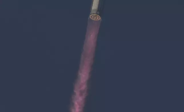 SpaceX's mega rocket Starship makes a test flight from Starbase, Texas, Tuesday, May 27, 2025. (AP Photo/Eric Gay)