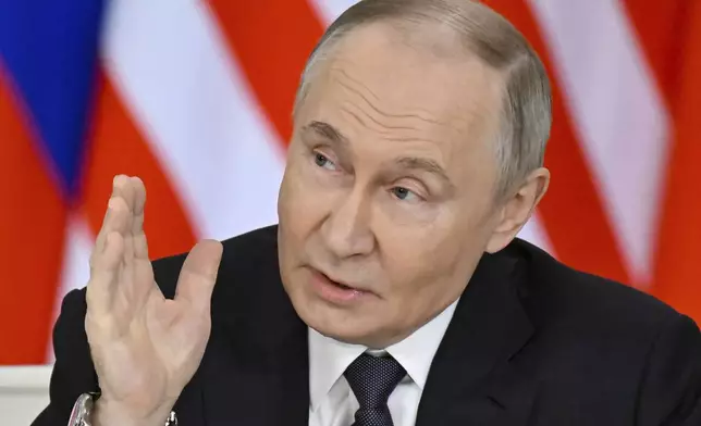 Russian President Vladimir Putin speaks during a joint press statement with Malaysian Prime Minister Anwar Ibrahim at the Kremlin in Moscow, Russia, Wednesday, May 14, 2025. (Alexander Nemenov/Pool Photo via AP)