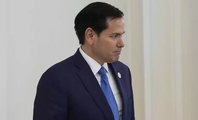 Secretary of State Marco Rubio departs a lunch between President Donald Trump and Qatar's Emir Sheikh Tamim bin Hamad Al Thani at the Amiri Diwan in Doha, Qatar, Wednesday, May 14, 2025. (AP Photo/Alex Brandon)