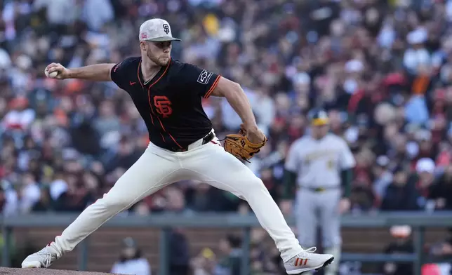San Francisco Giants pitcher Landen Roupp throws to an Athletics batter during the first inning of a baseball game Saturday, May 17, 2025, in San Francisco. (AP Photo/Godofredo A. Vásquez)