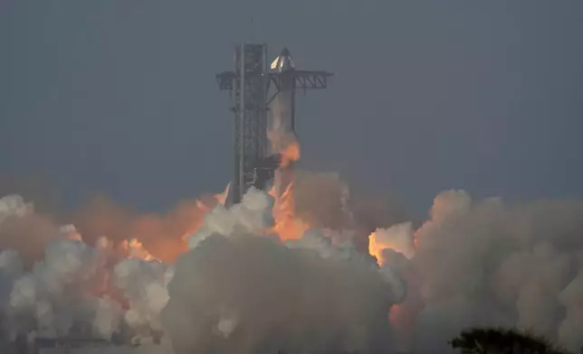 SpaceX's mega rocket Starship makes a test flight from Starbase, Texas, Tuesday, May 27, 2025. (AP Photo/Eric Gay)