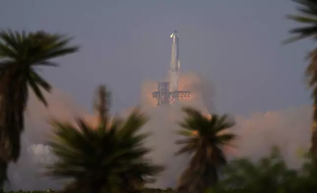 SpaceX's mega rocket Starship makes a test flight from Starbase, Texas, Tuesday, May 27, 2025. (AP Photo/Eric Gay)