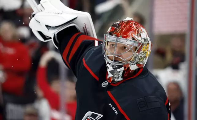 Carolina Hurricanes goaltender Frederik Andersen (31) directs traffic against the Washington Capitals during the third period of Game 3 of an NHL hockey Semi-final round playoff series in Raleigh, N.C., Saturday, May 10, 2025. (AP Photo/Karl DeBlaker)