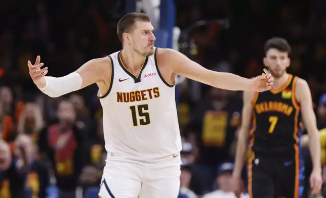 Denver Nuggets' Nikola Jokic (15) reacts to an officials call as Oklahoma City Thunder's Chet Holmgren (7) looks on in the second half of Game 1 of an NBA basketball second-round playoff series Monday, May 5, 2025, in Oklahoma City. (AP Photo/Nate Billings)
