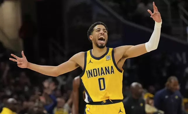 Indiana Pacers guard Tyrese Haliburton celebrates after scoring during the second half in Game 5 of an Eastern Conference semifinal NBA basketball playoff against the Cleveland Cavaliers, Tuesday, May 13, 2025, in Cleveland. (AP Photo/Sue Ogrocki)