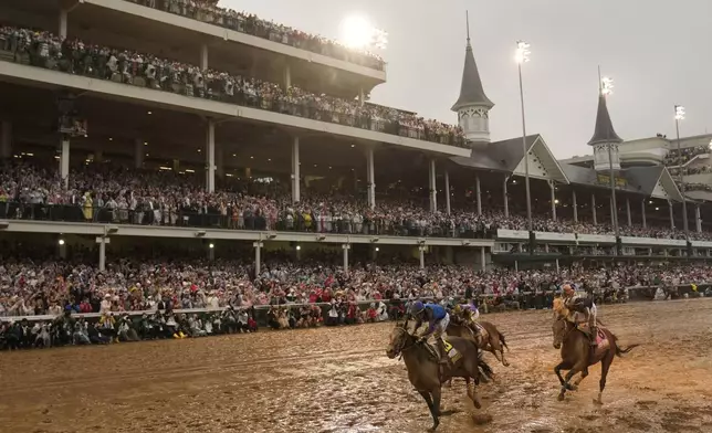 Sovereignty, ridden by Junior Alvarado, crosses the finish line to win the 151st running of the Kentucky Derby horse race at Churchill Downs Saturday, May 3, 2025, in Louisville, Ky. (AP Photo/Abbie Parr)
