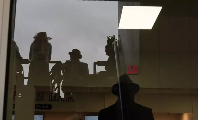 Race roam Churchill Downs before the 151st running of the Kentucky Derby horse race Saturday, May 3, 2025, in Louisville, Ky. (AP Photo/Brynn Anderson)