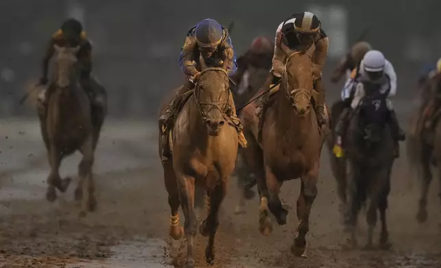 Sovereignty, ridden by Junior Alvarado, crosses the finish line to win the 151st running of the Kentucky Derby horse race at Churchill Downs Saturday, May 3, 2025, in Louisville, Ky. (AP Photo/Brynn Anderson)