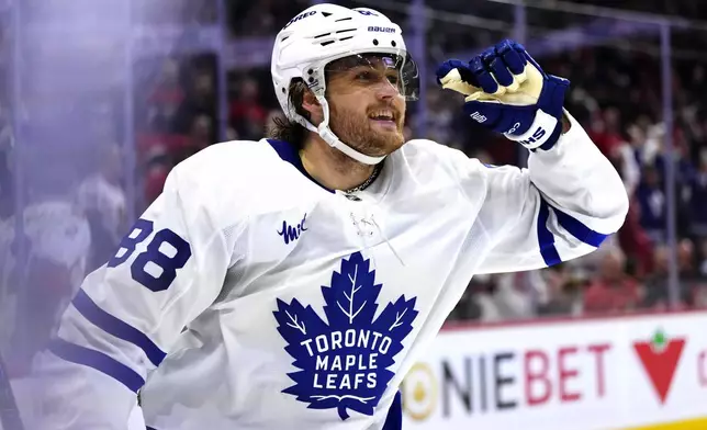 Toronto Maple Leafs' William Nylander (88) reacts after scoring an empty-net goal against the Ottawa Senators during the third period of Game 6 of a first-round NHL hockey playoff series in Ottawa, Ontario, Thursday, May 1, 2025. (Justin Tang/The Canadian Press via AP)
