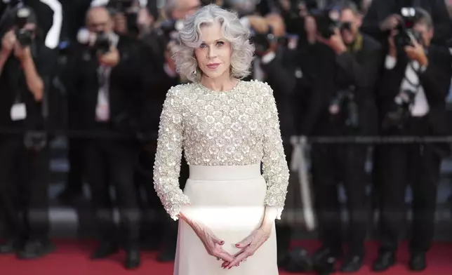 Jane Fonda poses for photographers during the awards ceremony red carpet at the 78th international film festival, Cannes, southern France, Saturday, May 24, 2025. (AP Photo/Natacha Pisarenko)