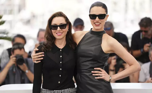 Aubrey Plaza, left, and Margaret Qualley pose for photographers at the photo call for the film 'Honey Dont!'' at the 78th international film festival in Cannes, southern France, Saturday, May 24, 2025. (Photo by Scott A Garfitt/Invision/AP)