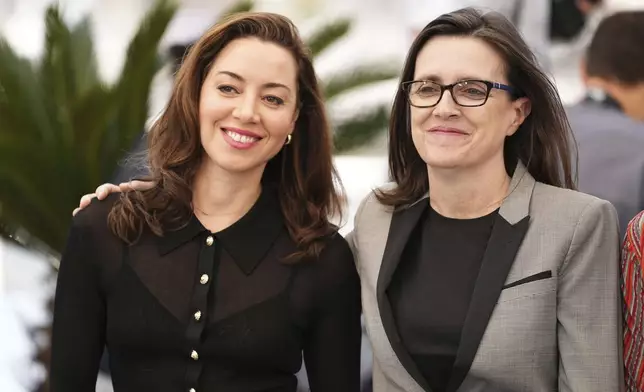 Aubrey Plaza, left, and writer Tricia Cooke pose for photographers at the photo call for the film 'Honey Dont!'' at the 78th international film festival in Cannes, southern France, Saturday, May 24, 2025. (Photo by Scott A Garfitt/Invision/AP)