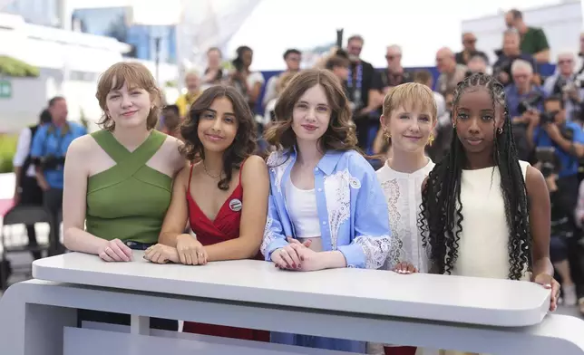Elsa Houben, from left, Samia Hilmi, Babette Verbeek, Janaina Halloy and Lucie Laruelle pose for photographers at the photo call for the film 'Jeunes Meres' at the 78th international film festival in Cannes, southern France, Saturday, May 24, 2025. (Photo by Lewis Joly/Invision/AP)