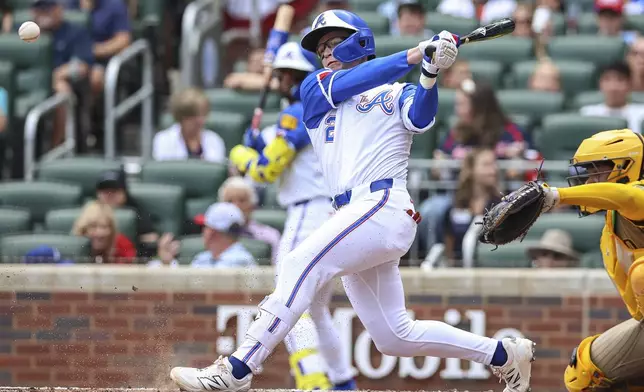 Atlanta Braves' Nick Allen (2) drives in a run with an infield single in the second inning of a baseball game against the San Diego Padres, Saturday, May 24, 2025, in Atlanta. (AP Photo/Colin Hubbard)