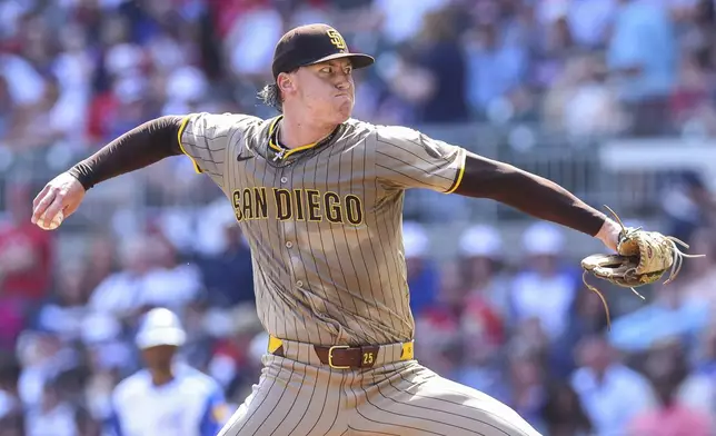 San Diego Padres pitcher Sean Reynolds delivers in the first inning of a baseball game against the Atlanta Braves, Saturday, May 24, 2025, in Atlanta. (AP Photo/Colin Hubbard)