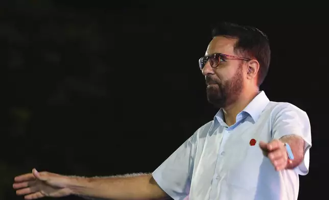 Singapore opposition leader and Workers' Party (WP) Secretary-General, Pritam Singh greets supporters at the assembly centre during the general election in Singapore, Saturday, May 3, 2025. (AP Photo/Suhaimi Abdullah)