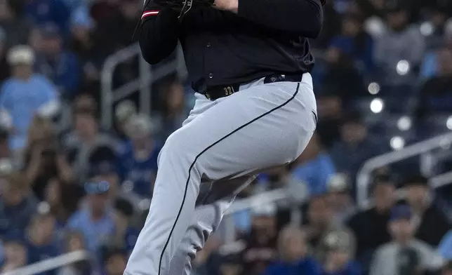 Cleveland Guardians starting pitcher Gavin Williams (32) throws to a Toronto Blue Jays batter during the first inning of a baseball game in Toronto, Saturday, May 3, 2025. (Jon Blacker/The Canadian Press via AP)