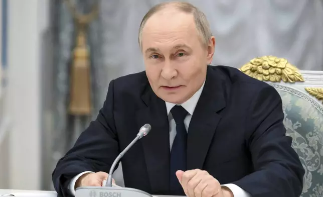 FILE - Russian President Vladimir Putin holds a meeting with members of Russia's business community at the Kremlin in Moscow, Russia, Monday, May 26, 2025. (Grigory Sysoyev, Sputnik, Kremlin Pool Photo via AP, File)