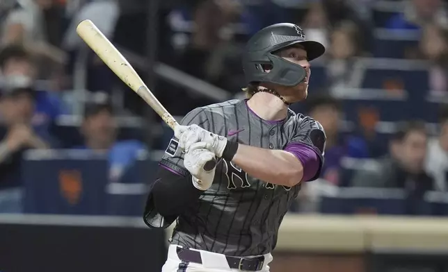 New York Mets' Brett Baty follows through on a three-run home run during the fourth inning of a baseball game against the Chicago Cubs Saturday, May 10, 2025, in New York. (AP Photo/Frank Franklin II)