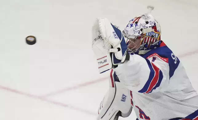 United States' Jeremy Swayman saves during the final match between United States and Switzerland at the ice hockey world championships in Stockholm, Sweden, Sunday, May 25, 2025. (AP Photo/Petr David Josek)