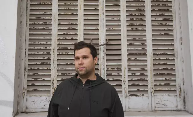 Santiago Difkstra stands for a portrait in Buenos Aires, Argentina, on Thursday, May 1, 2025. (AP Photo/Natacha Pisarenko)