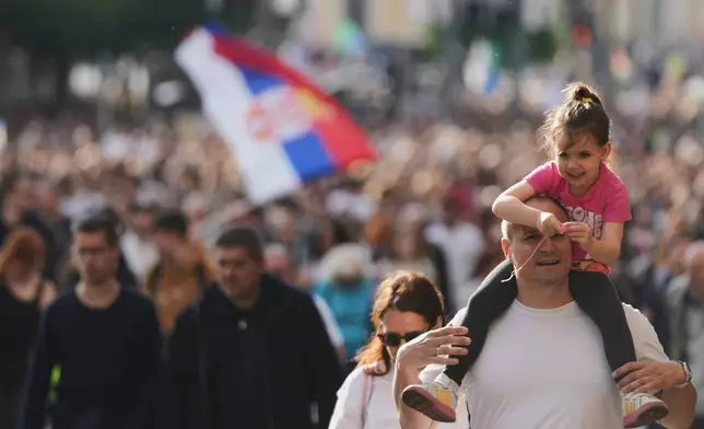 University students and people march during a protest, seven months after the deadly train station tragedy that sparked mass demonstrations against corruption in Belgrade, Serbia, Friday, May 30, 2025. (AP Photo/Darko Vojinovic)