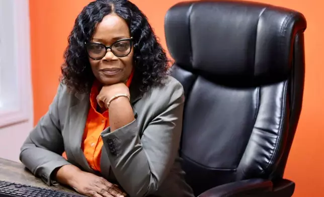 CORRECTS TITLE TO CHIEF EXECUTIVE OFFICER FROM EXECUTIVE DIRECTOR - The Campaign Against Hunger Chief Executive Officer Melony Samuels sits in her office in the Brooklyn borough of New York, Tuesday, April 15, 2025. (AP Photo/James Pollard)