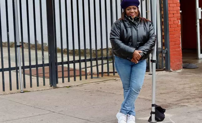 Kim Dennis, 65, visits The Campaign Against Hunger's distribution center in the Brooklyn borough of New York, Tuesday, April 15, 2025. (AP Photo/James Pollard)