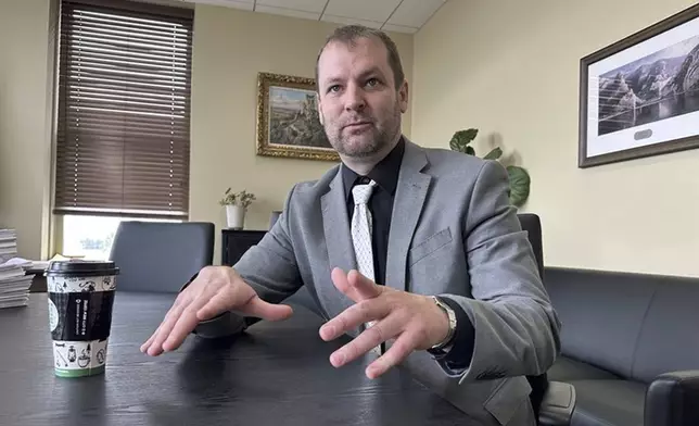 Republican state Senate President Matt Regier speaks during an interview in his office at the state Capitol, April 16, 2025, in Helena, Mont. (AP Photo/Matthew Brown)