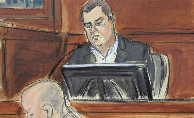 George Kaplan, Sean "Diddy" Combs' former personal assistant, testifies on the witness stand during Sean "Diddy" Combs' sex trafficking and racketeering trial in Manhattan federal court, Wednesday, May 21, 2025, in New York. (Elizabeth Williams via AP)