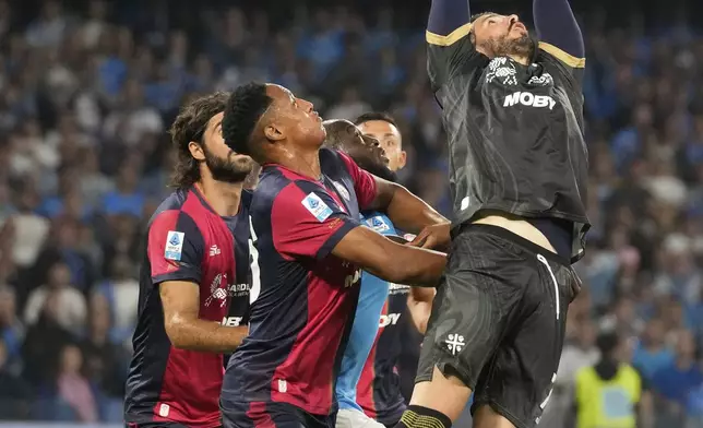 Cagliari's goalkeeper Alen Sherri saves a ball during the Italian Serie A soccer match between Napoli and Cagliari at the Diego Maradona stadium in Naples, Italy, Friday, May 23, 2025. (AP Photo/Gregorio Borgia)