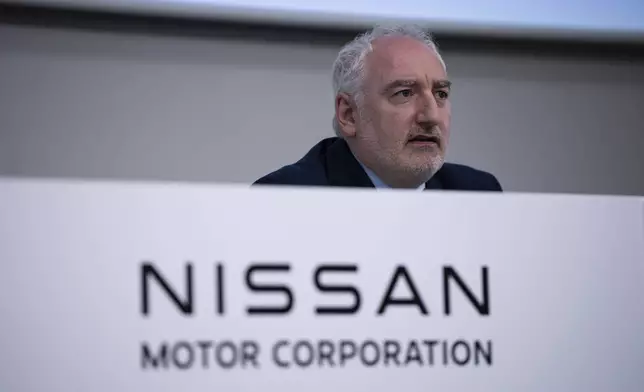 Nissan CFO Jeremie Papin attends a press conference to announce 2024 fiscal year financial results in Yokohama, Tuesday, May 13, 2025. (AP Photo/Louise Delmotte)