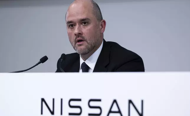 Nissan CEO Ivan Espinosa attends a press conference to announce 2024 fiscal year financial results in Yokohama, Tuesday, May 13, 2025. (AP Photo/Louise Delmotte)