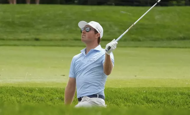 Ben Griffin watches his shot from the rough on the 10th fairway during the first round of the Memorial golf tournament Thursday, May 29, 2025, in Dublin, Ohio. (AP Photo/Sue Ogrocki)