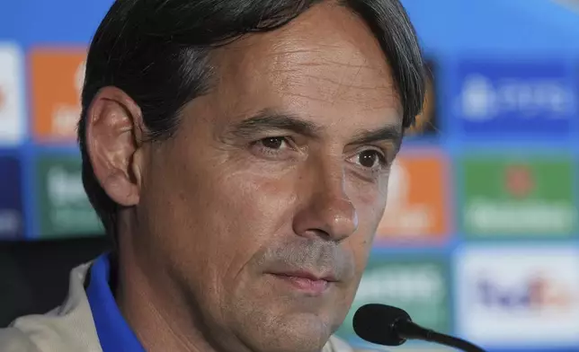 Inter Milan's head coach Simone Inzaghi answers to reporters during the Champions League Media Day in view of the Saturday's Champions League final against PSG, at the Inter Milan training center, in Appiano Gentile, Italy, Monday, May 26, 2025. (AP Photo/Antonio Calanni)