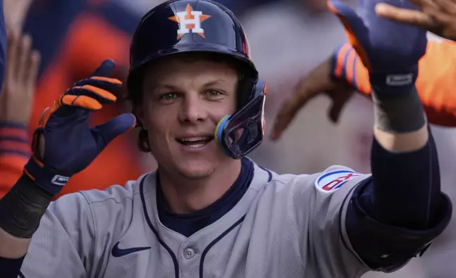 Houston Astros' Jake Meyers (6) celebrates after hitting a 3-run home run during the sixth inning of a baseball game against the Chicago White Sox, Saturday, May 3, 2025, in Chicago. (AP Photo/Erin Hooley)