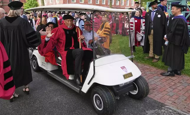 Hall of Fame center and honorary degree recipient Kareem Abdul-Jabbar is welcomed at Harvard Yard during commencement ceremonies at Harvard University, Thursday, May 29, 2025, in Cambridge, Mass. (AP Photo/Charles Krupa)