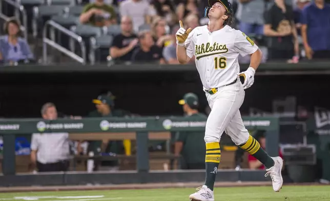 Athletics' Nick Kurtz celebrates hitting a home run during the seventh inning of a baseball game against the Los Angeles Angels in West Sacramento, Calif., Wednesday, May 21, 2025. (AP Photo/Nic Coury)