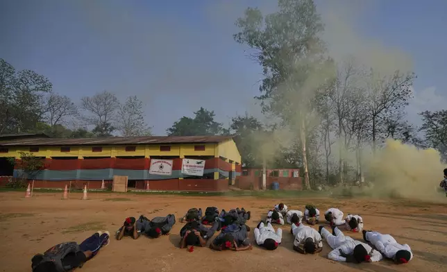 National Cadet Corps members participate during a mock drill to train civilians and security personnel to respond in case of attack, in Guwahati, India, Wednesday, May 7, 2025 amid rising fears of wider conflict following India's strikes in Pakistan. (AP Photo/Anupam Nath)