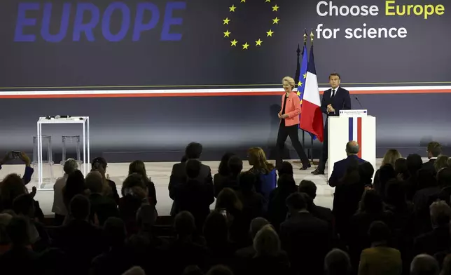 French President Emmanuel Macron and European Commission President Ursula Von der Leyen attend the "Choose Europe for Science" event, to encourage researchers and scientists from all over the world to practice in Europe, at the Sorbonne University in Paris, Monday, May 5, 2025.(Gonzalo Fuentes/Pool via AP)