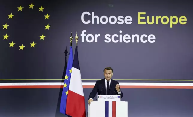 French President Emmanuel Macron delivers his speech at the "Choose Europe for Science" event, to encourage researchers and scientists from all over the world to practice in Europe, at the Sorbonne University in Paris, Monday, May 5, 2025.(Gonzalo Fuentes/Pool via AP)