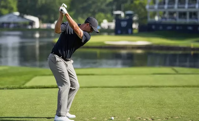 Adam Scott, of Australia, hits his tee shot on the 17th hole during the first round of the PGA Championship golf tournament at the Quail Hollow Club, Thursday, May 15, 2025, in Charlotte, N.C. (AP Photo/David J. Phillip)
