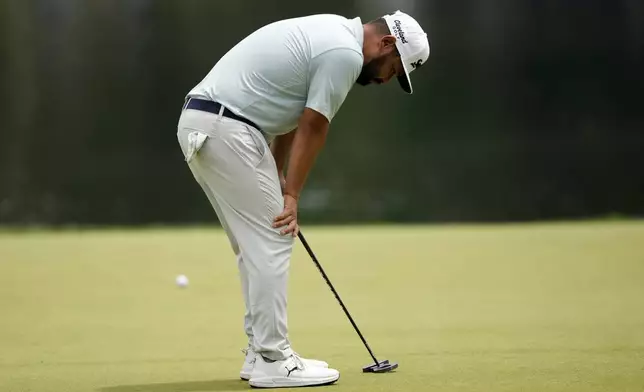 J.J. Spaun reacts after missing a putt on the 17th hole during the second round of the PGA Championship golf tournament at the Quail Hollow Club, Friday, May 16, 2025, in Charlotte, N.C. (AP Photo/Matt York)